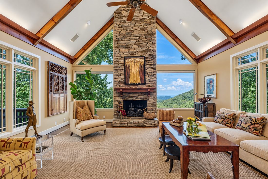Living room, stone fireplace to the gable